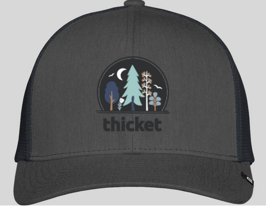 the most badass hat in the universe. dark grey. logo has a bunch of different types of trees and says thicket.